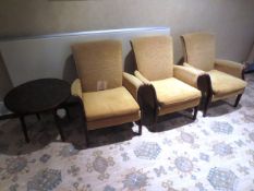 Three cream cloth upholstered , dark-wood framed arm chairs and dark-wood table