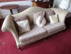 Cream cloth upholstered three seater sofa