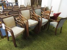 Approximately 10 timber-framed green cloth upholstered stacking chairs, three dark-wood circular