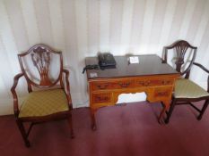 Two dark-wood chairs and dark-wood 4-drawer desk