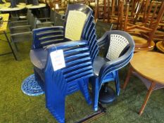 Eleven blue/white plastic stackable chairs