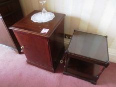 Dark-wood single door cabinet and glass topped side table