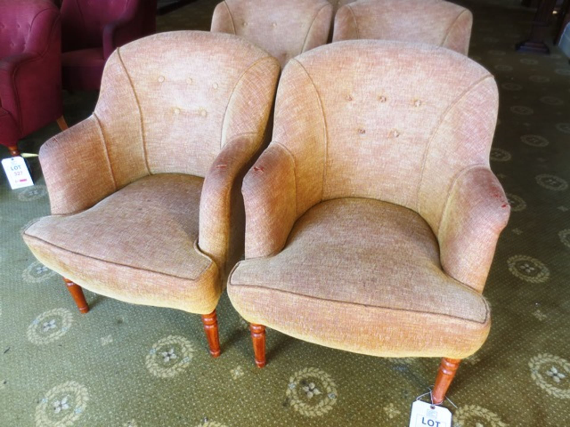 Two cream cloth upholstered tub chairs (Please note: image for illustrative purposes only)