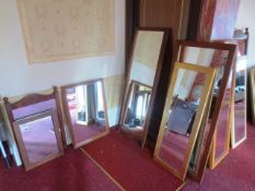 Twelve various timber framed wall mirrors