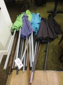 Fifteen various collapsible parasol umbrellas