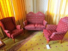 Red cloth upholstered 2-seater sofa and two matching armchairs (Please note: requires repair) (
