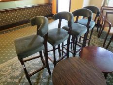 Four dark wood effect green cloth upholstered bar stools