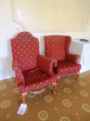 Two red cloth upholstered armchairs (Please note: requires repair)