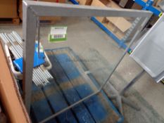 Metal framed glass panel splash protection shield (approx. 800mm height x 700mm wide).
