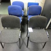 Five assorted blue and two black cloth upholstered static meeting room chairs (only four blue chairs
