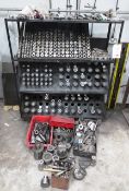 Four shelves of assorted turret punch tooling on 4 shelf mobile trolley rack.