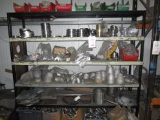 Contents of bay including flanges, exhaust brackets, clamps etc.