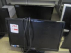 Two computer flat screen monitors