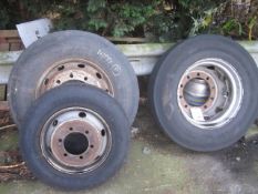 Three assorted tyres and rims, as lotted