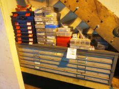 Assorted electrical and fastening stock, unused, as lotted with 5 drawer rack