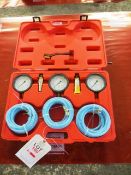 Brake bleeding kit including three pressure gauges, hoses and case