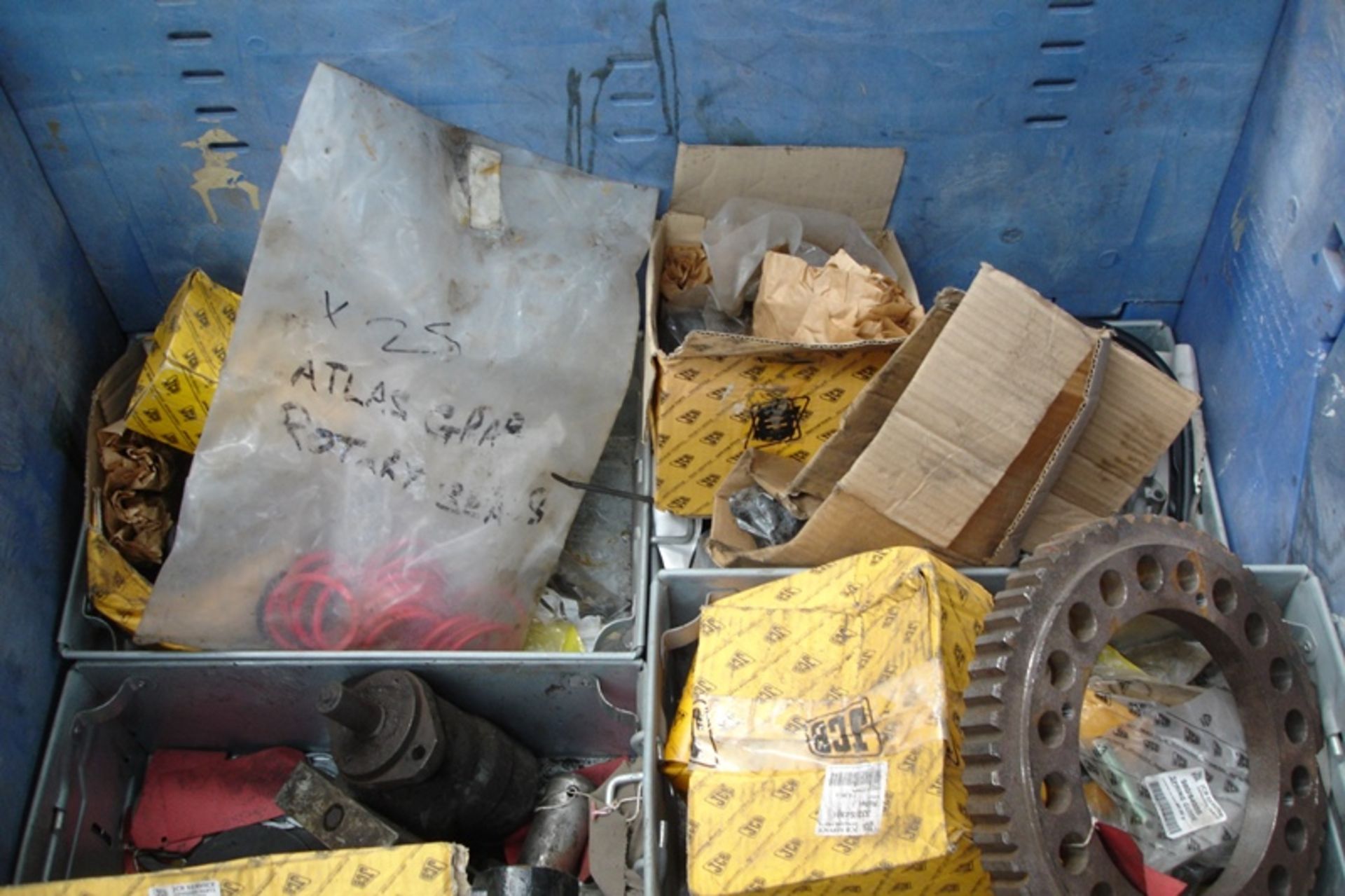 Crate of mainly JCB spares