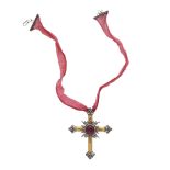 An antique pink garnet and diamond cross pendant in yellow and white metal, the large, central
