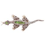 An antique Victorian / Edwardian jewelled lizard brooch, in high carat yellow gold and platinum, set