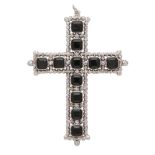 A large antique onyx and diamond cross pendant in white metal, set with eleven emerald cut onyx