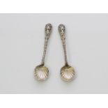 A pair of antique Victorian Sterling Silver salt spoons by Henry William Curry, London 1874. With