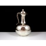 Yachting interest - An antique Victorian Sterling Silver water / wine jug by Charles Frederick