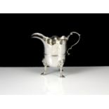 An antique George II / III Irish Sterling Silver cream jug by Andrew Goodwin, Dublin c1755. Of