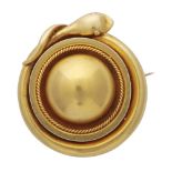 An unusual antique late Victorian mourning brooch in high carat yellow gold, of circular form with a