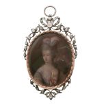 An antique jewelled portrait miniature pendant, the oval miniature depicting a lady dressed with