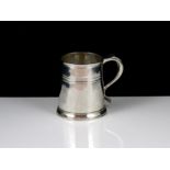 An Antique Queen Anne Britannia Silver mug by Seth Lofthouse, London 1708. The tapering, straight