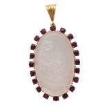 An antique moonstone cameo pendant in yellow gold, the oval cabochon moonstone with a carved cameo