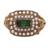 An antique William IV emerald and pearl mourning ring in 18ct yellow gold, hallmarked 1836. The