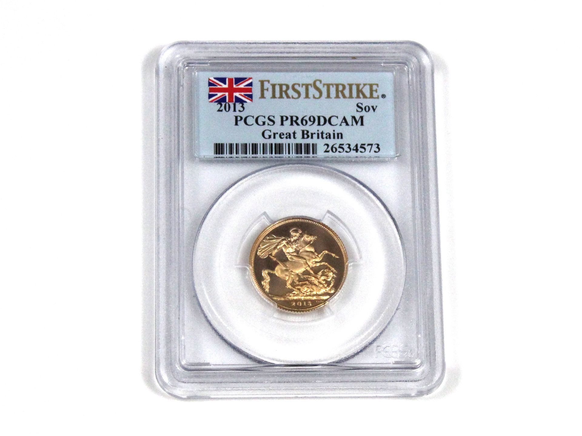 A PGCS FirstStrike 2013 Proof Full Gold Sovereign Coin sealed and boxed with certificate of