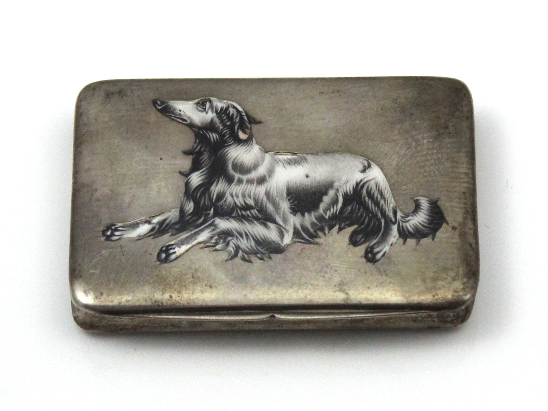 An antique German 800 Silver and enamel cigarette case / snuff box of rounded rectangular form