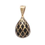 SARAH FABERGE - A contemporary enamelled egg pendant in 18ct yellow gold by Sarah Faberge,