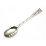 An antique George III Irish Sterling Silver hook end basting spoon by Alexander Richards, Dublin