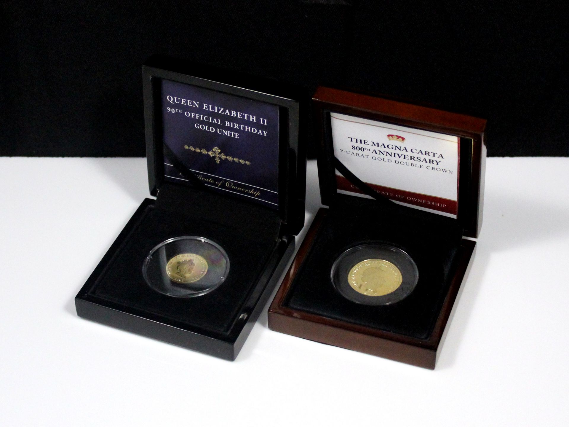 A 9ct gold proof double crown commemorating the 800th anniversary of the Magna Carta, sealed and