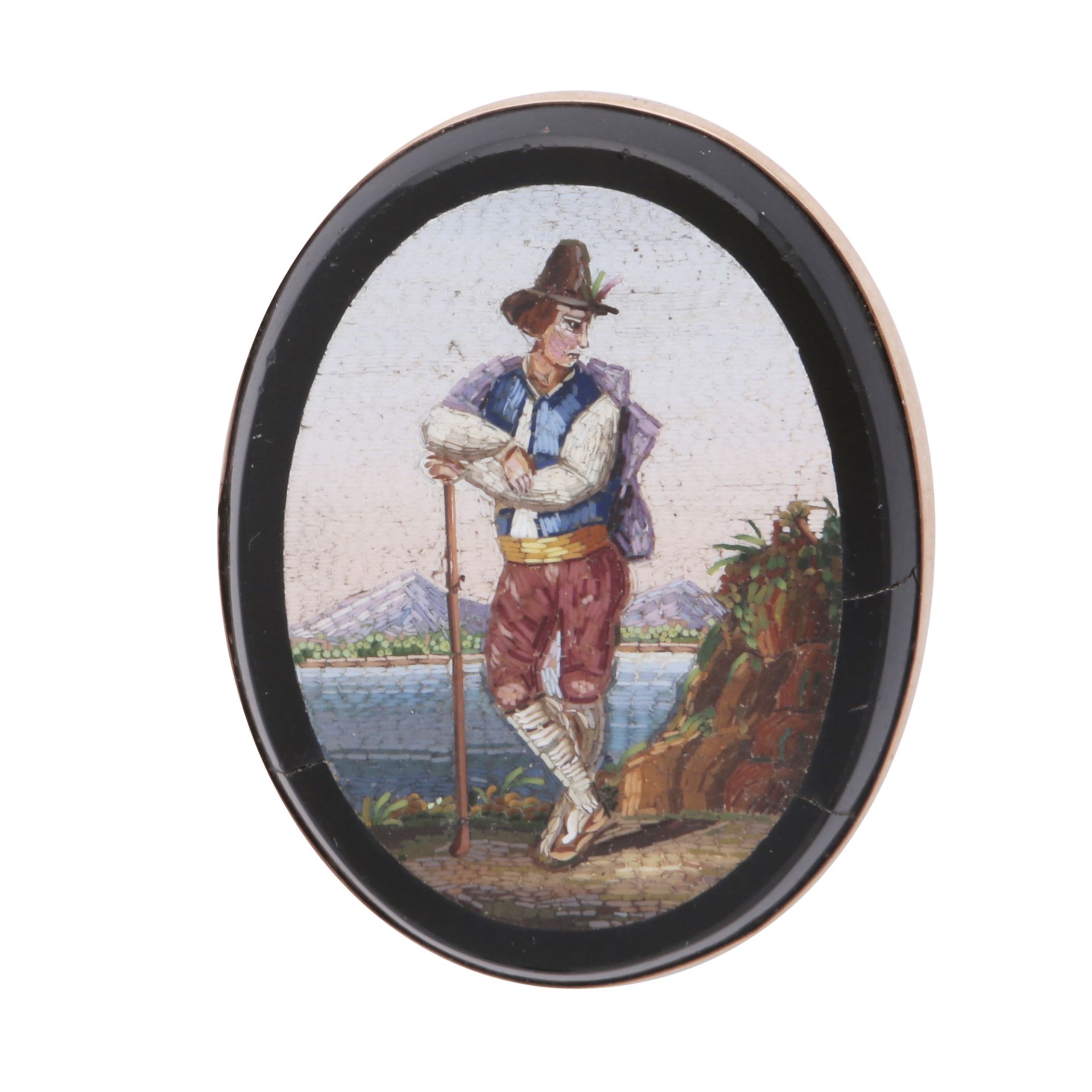 An antique 19th Century micromosaic pendant / brooch of oval form, depicting a gentleman against a