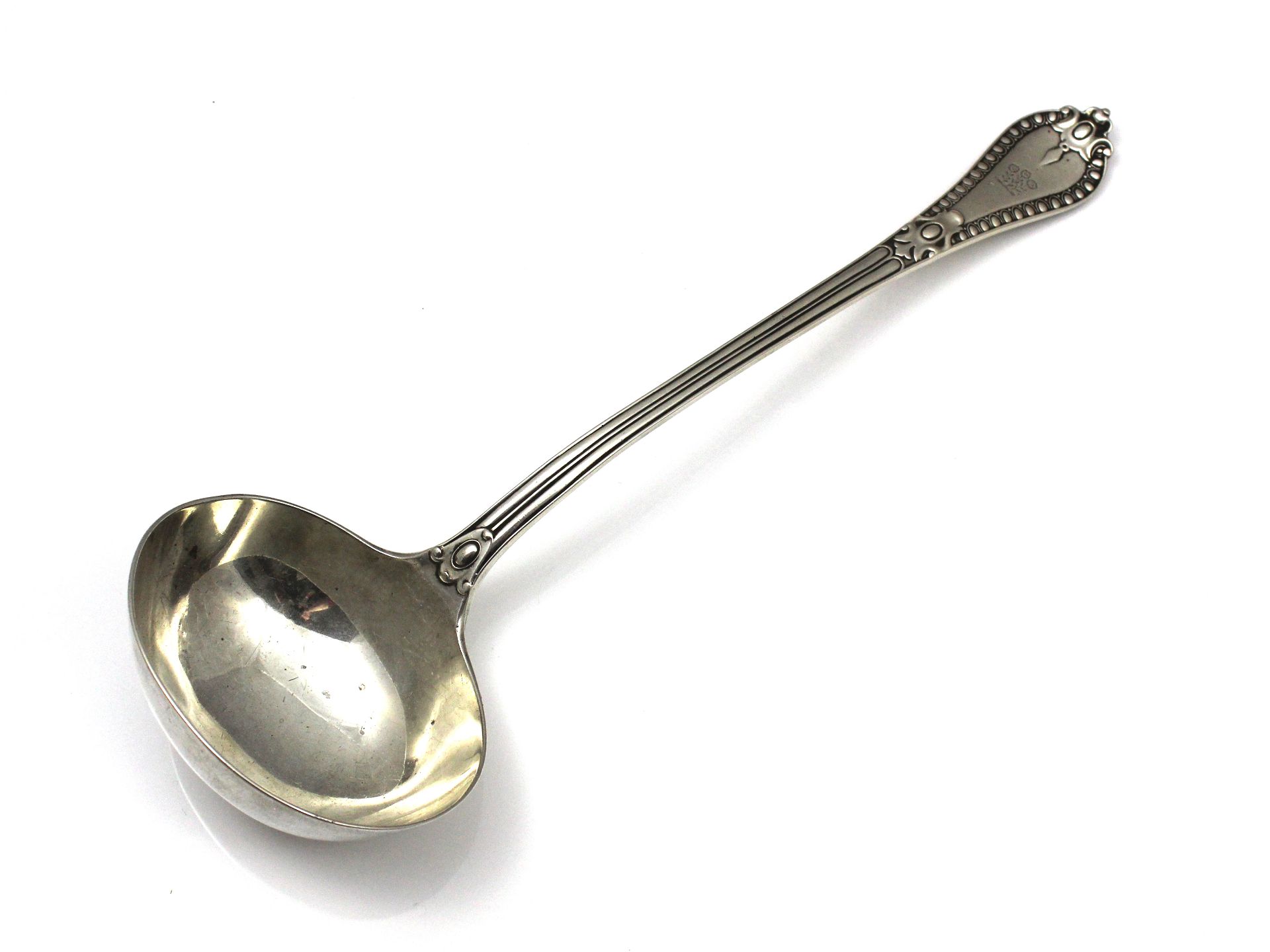 A rare antique Victorian Sterling Silver soup ladle by George Adams, London 1859. In Grecian