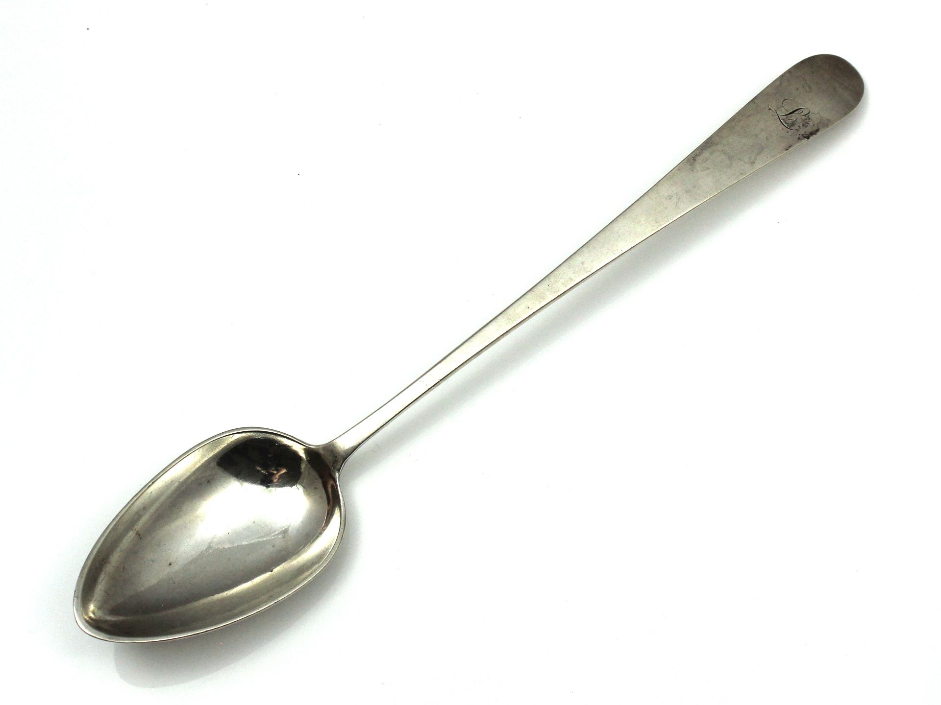 An antique George III provincial Irish Sterling Silver basting spoon by John Nicholson of Cork circa