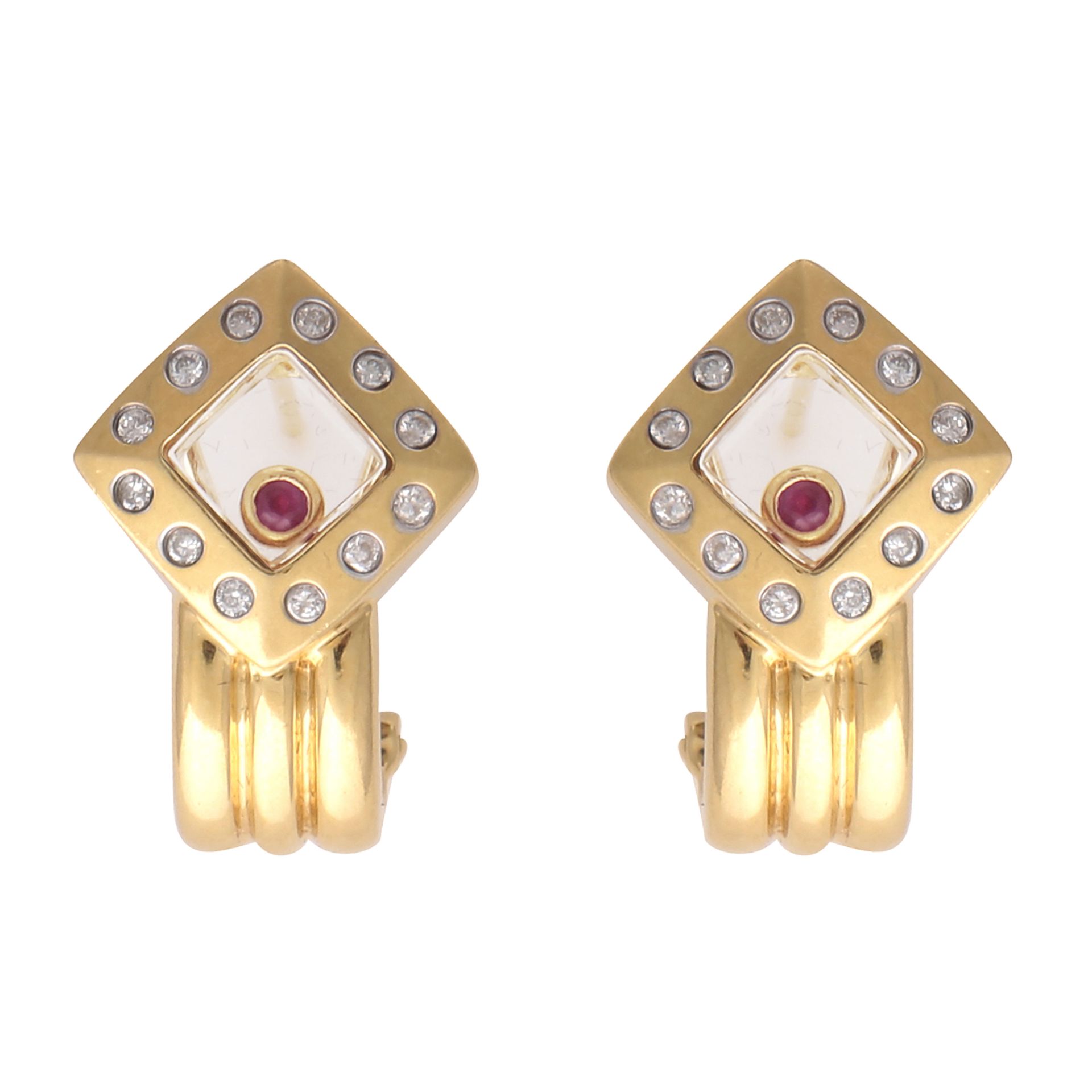 A pair of ruby and diamond earrings in the manner of Chopard 'Happy Diamonds' collection, in 18ct