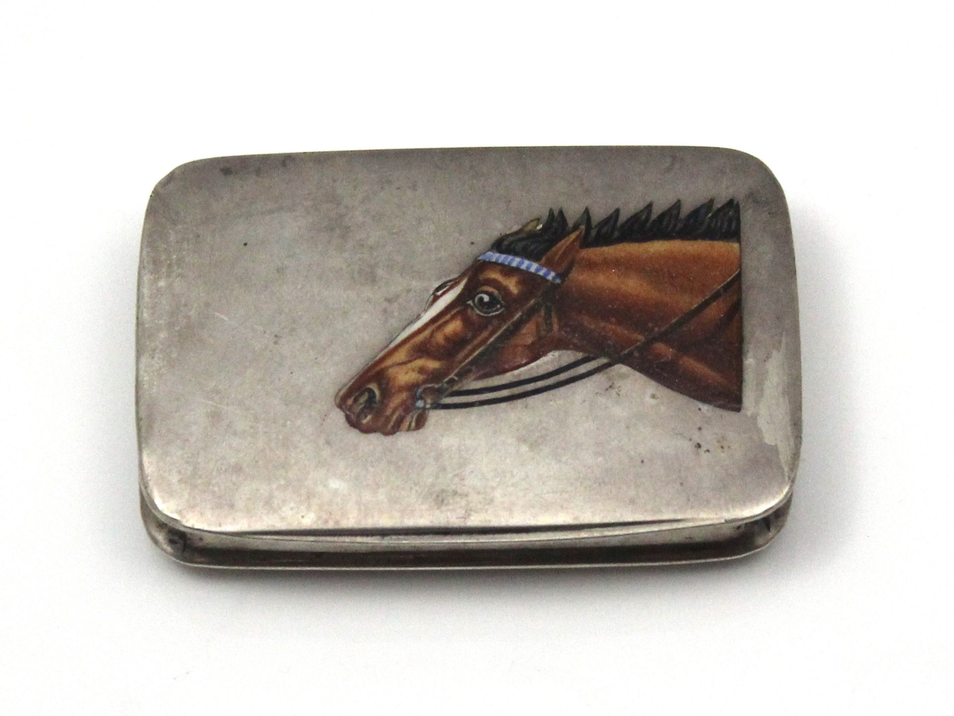 An antique German 800 Silver and enamel cigarette case / snuff box of rounded rectangular form