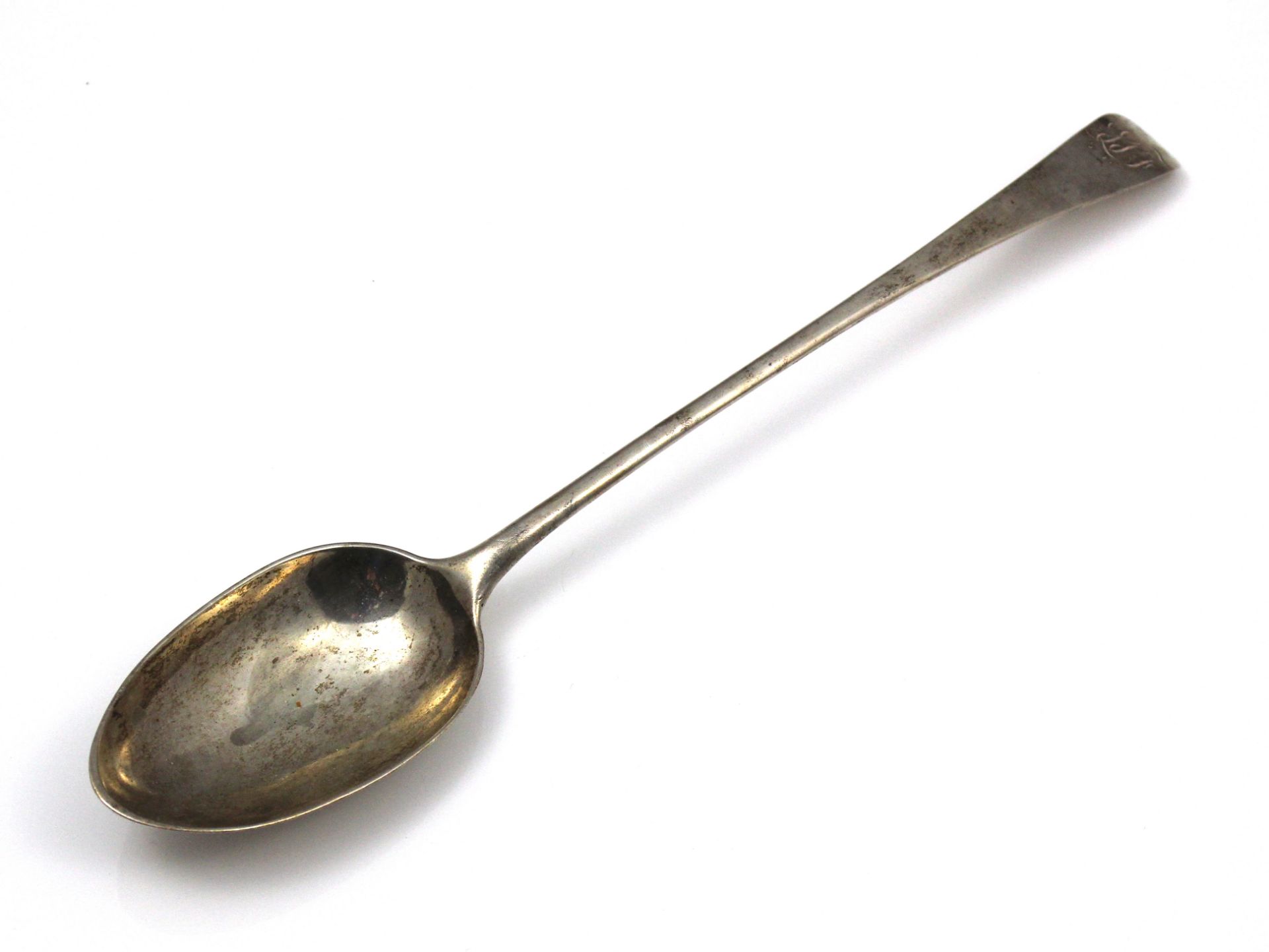 An antique George III Scottish Sterling Silver basting spoon by Alexander Gordon, Edinburgh 1772. In