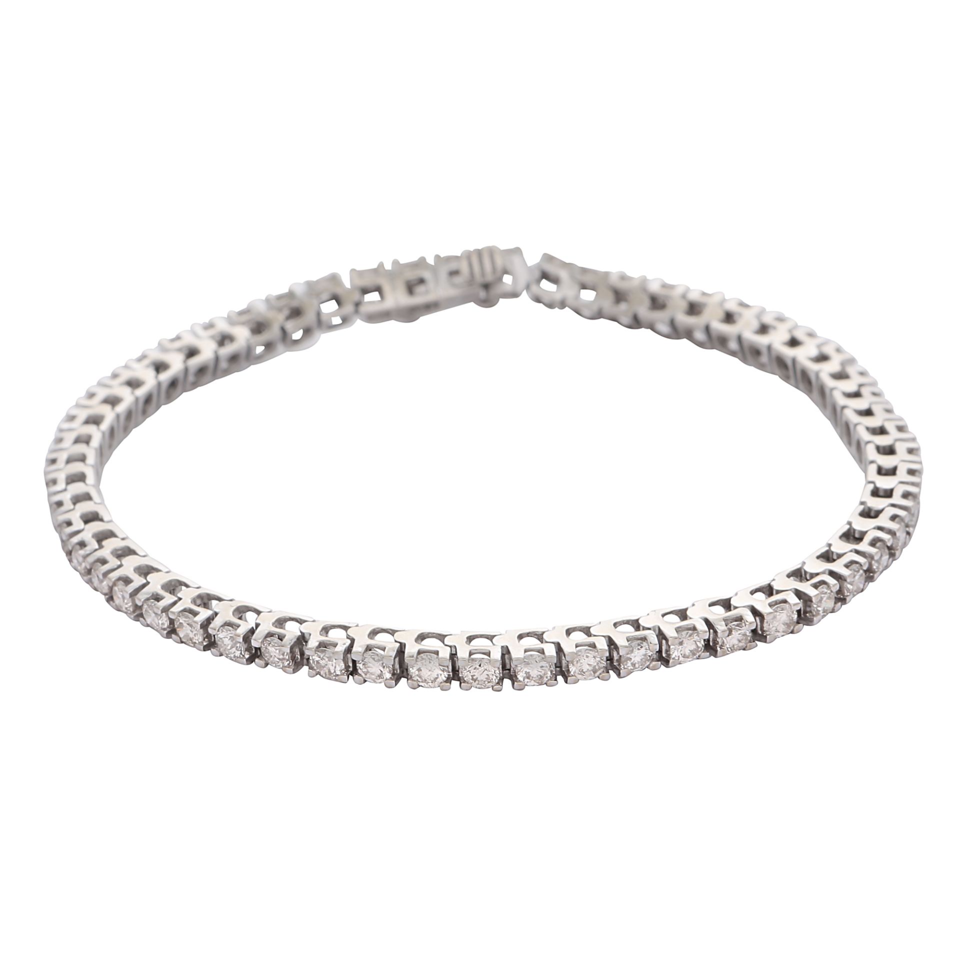 A diamond line / tennis bracelet in 18ct white gold, set with fifty five round brilliant cut