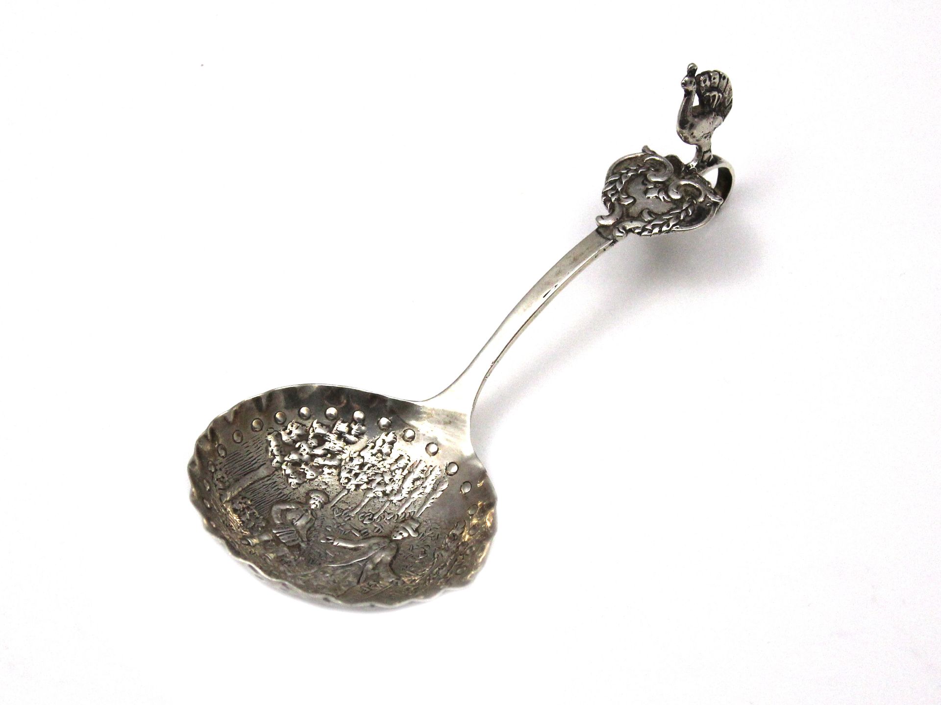 An antique Dutch silver jam / condiment spoon pseudo marked and with English import marks for