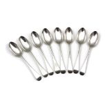 A set of eight antique George III Sterling Silver dessert spoons maker's mark S J, London 1767. In