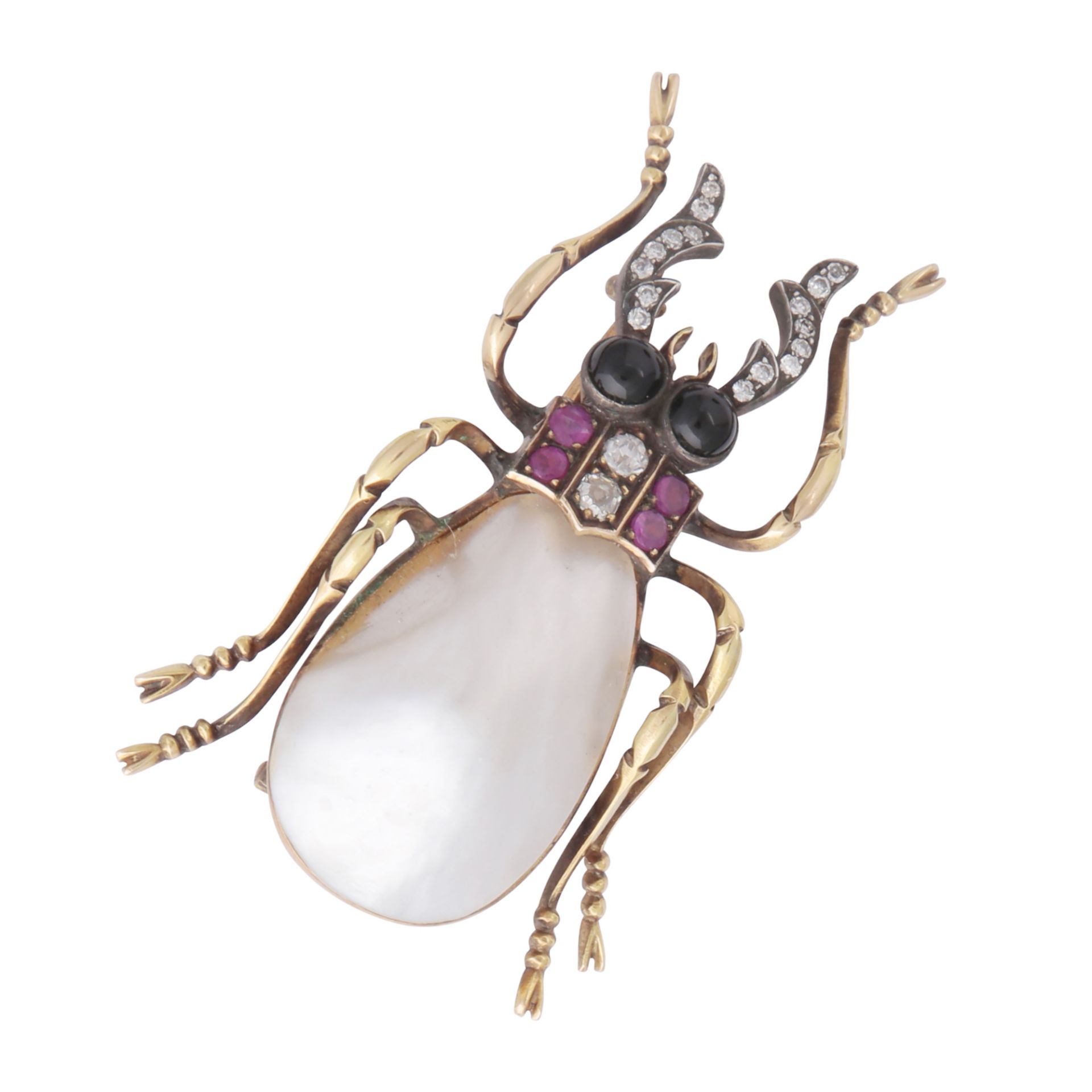 An unusual jewelled insect brooch in yellow gold, designed as a beetle, its back set with mother