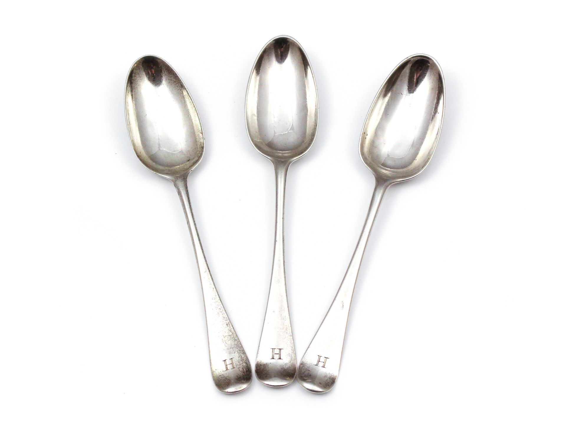 SPENCER FAMILY Three Antique George II Sterling Silver tablespoons by Elias Cachart, London 1755. In