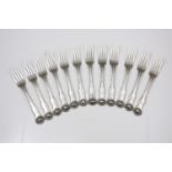 A set of twelve antique Victorian Sterling Silver dessert forks by Henry Holland, London 1841. In