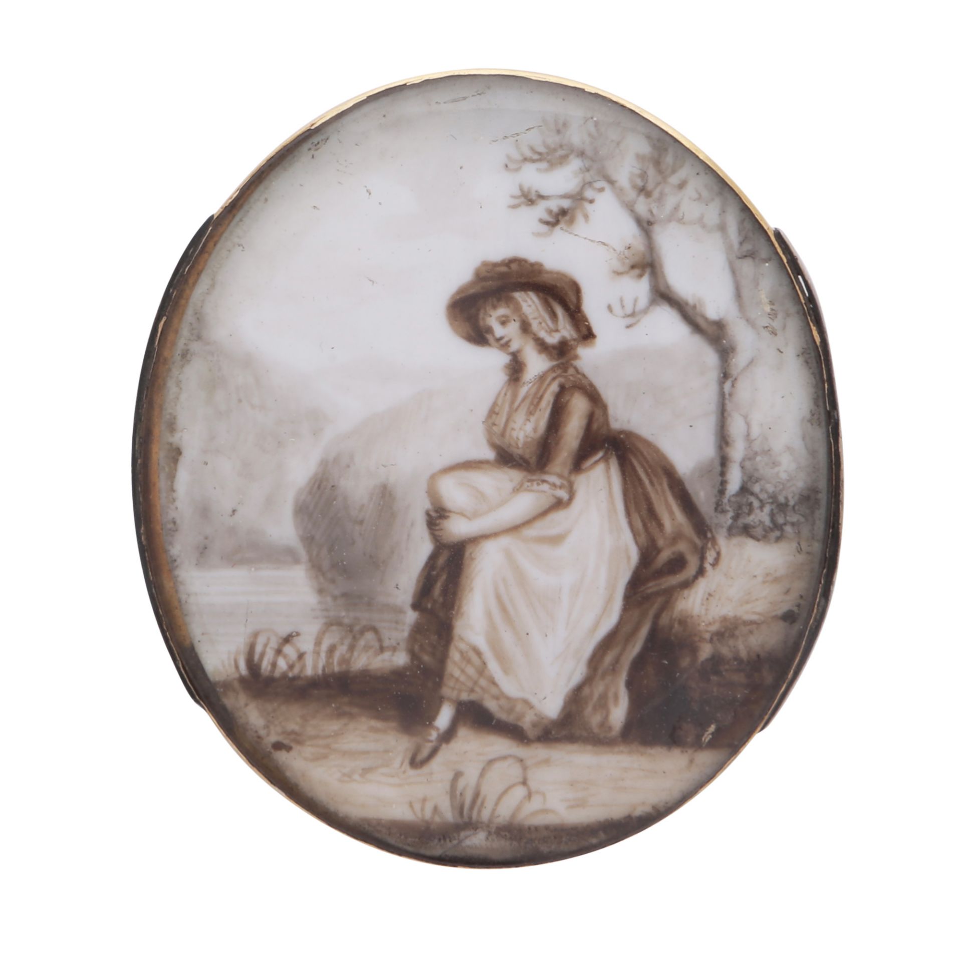 An antique Victorian portrait miniature brooch of oval form, depicting a young lady in an outdoor